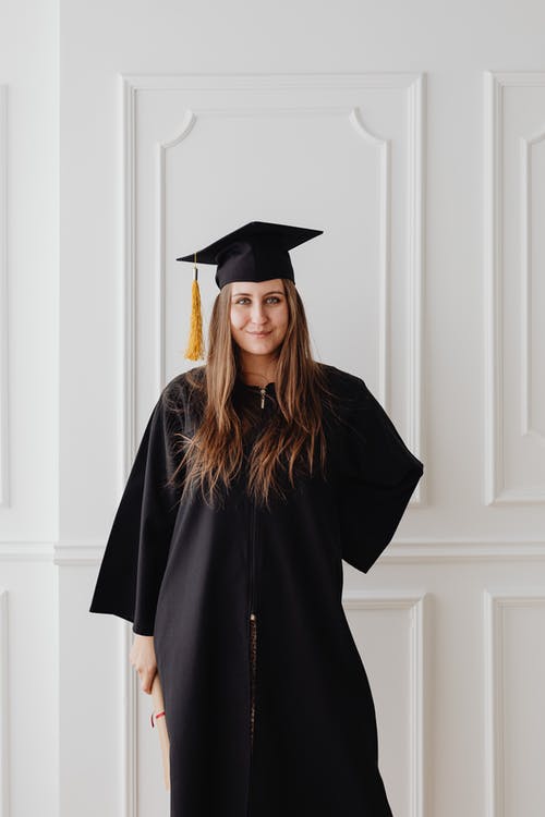 有关垂直拍摄, 女人, 学术着装的免费素材图片