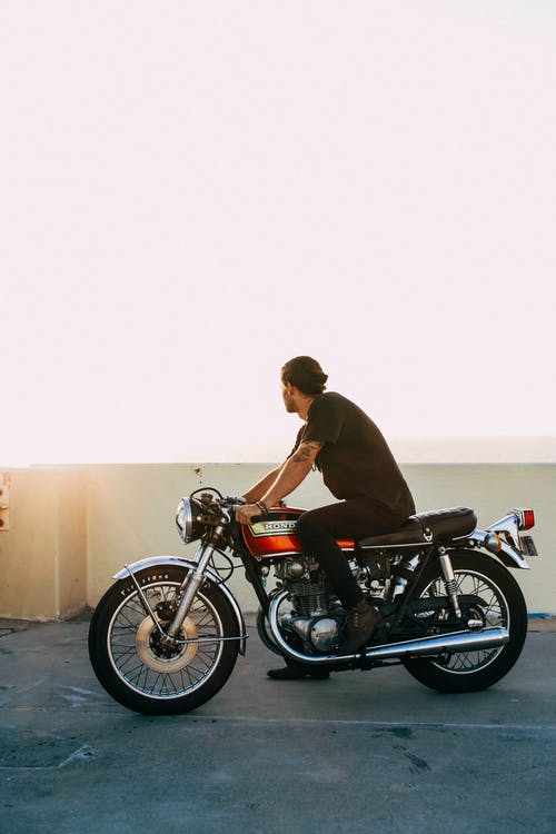 有关人, 垂直拍摄, 摩托車的免费素材图片