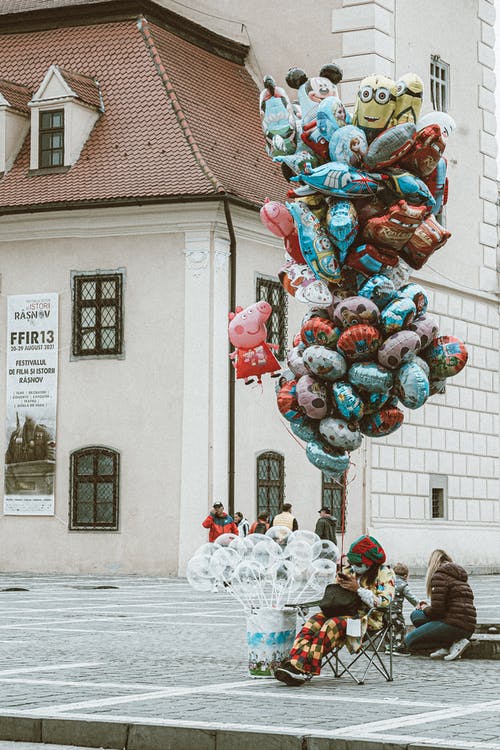 有关坐, 垂直拍摄, 氣球的免费素材图片