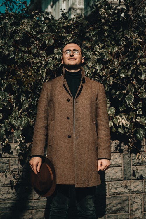 有关人, 垂直拍摄, 大衣的免费素材图片