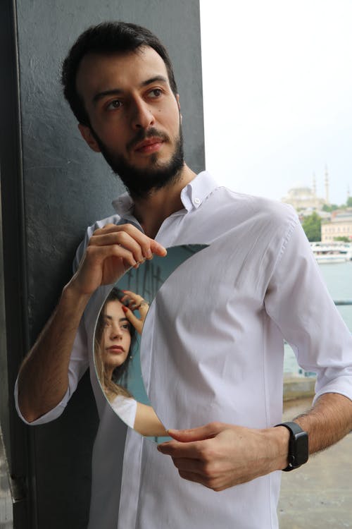 有关人, 反射, 垂直拍摄的免费素材图片