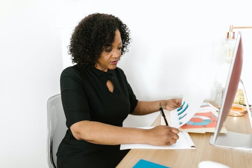 有关商業, 坐, 女人的免费素材图片