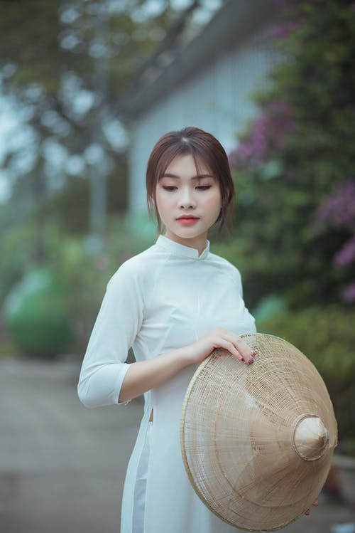 有关垂直拍摄, 太陽帽, 女人的免费素材图片