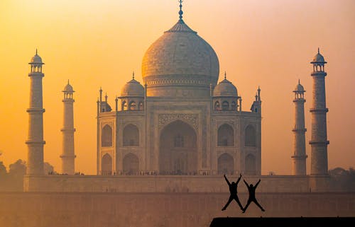 日落期间的白色和棕色圆顶建筑 · 免费素材图片