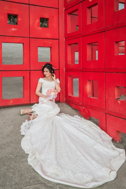 有关坐, 垂直拍摄, 女人的免费素材图片