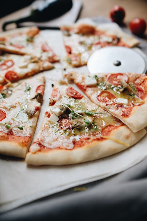有关垂直拍摄, 披萨刀, 披薩的免费素材图片