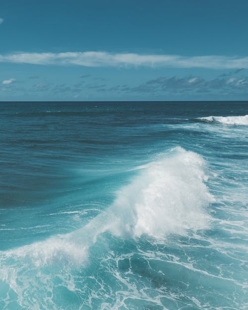 有关垂直拍摄, 撞击波浪, 水的免费素材图片