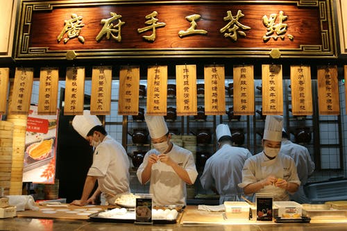 有关中国菜, 厨师, 开放式厨房的免费素材图片
