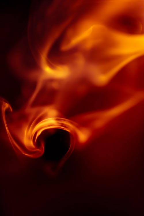 有关垂直拍摄, 抽煙, 漆黑的免费素材图片