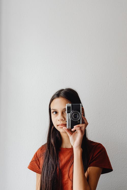 有关Olympus, 垂直拍摄, 女孩的免费素材图片