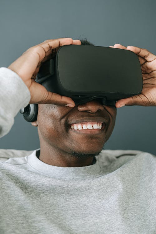 有关vr耳機, 人, 垂直拍摄的免费素材图片
