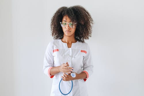 有关女人, 捲髮, 握住的免费素材图片