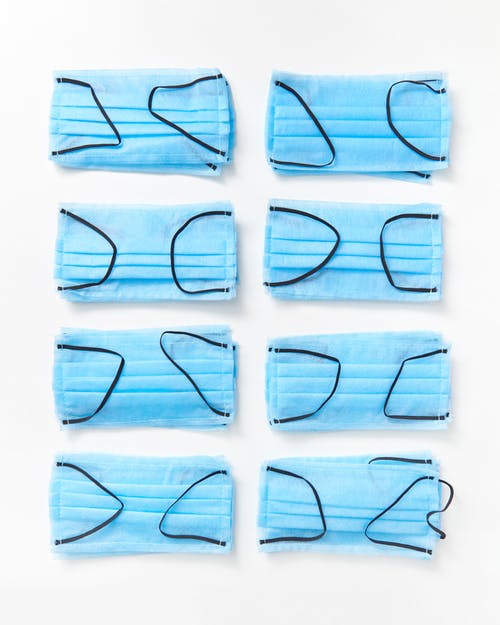 有关口罩, 垂直拍摄, 白色的表面的免费素材图片