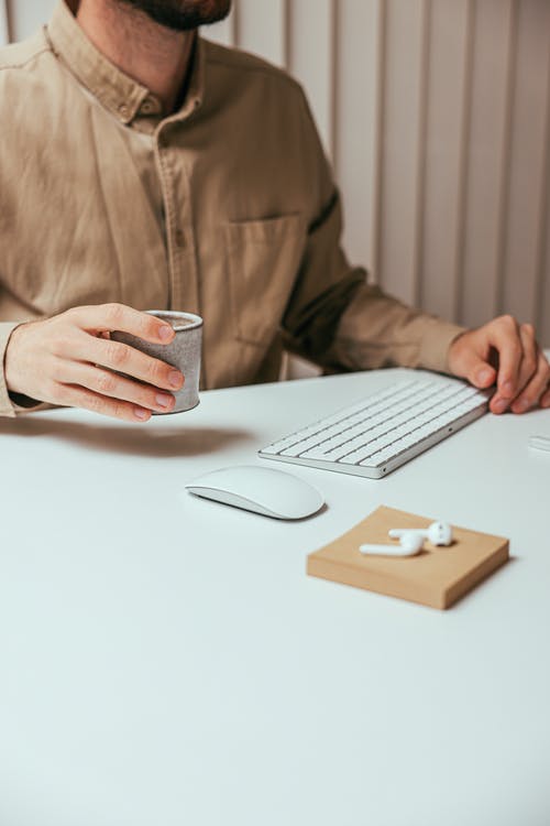 有关一杯咖啡, 办公桌, 垂直拍摄的免费素材图片