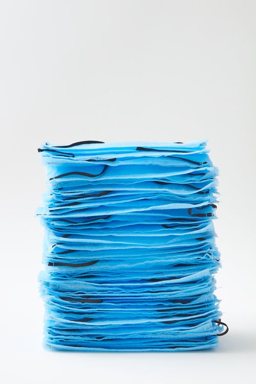 有关口罩, 垂直拍摄, 堆的免费素材图片