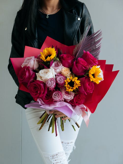 有关不露面, 向日葵, 垂直拍摄的免费素材图片