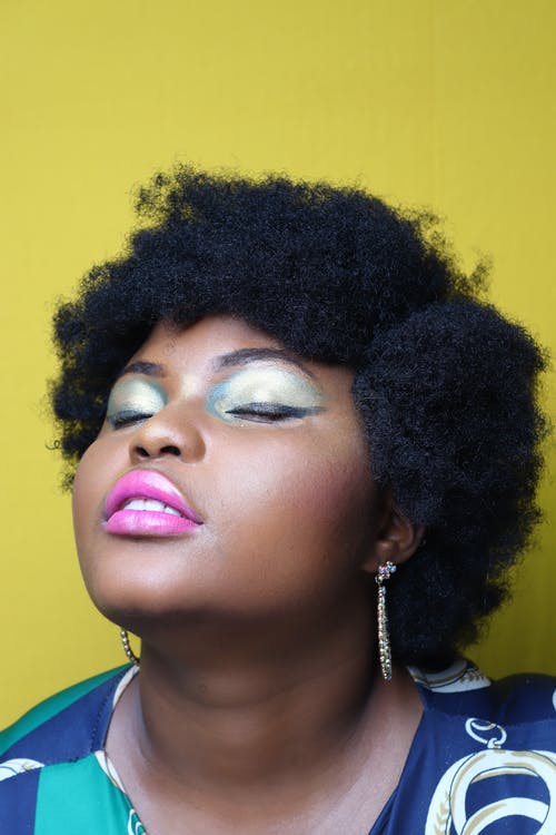 有关光鮮亮麗, 垂直拍摄, 女人的免费素材图片