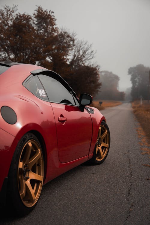 有关交通系統, 垂直拍摄, 跑車的免费素材图片