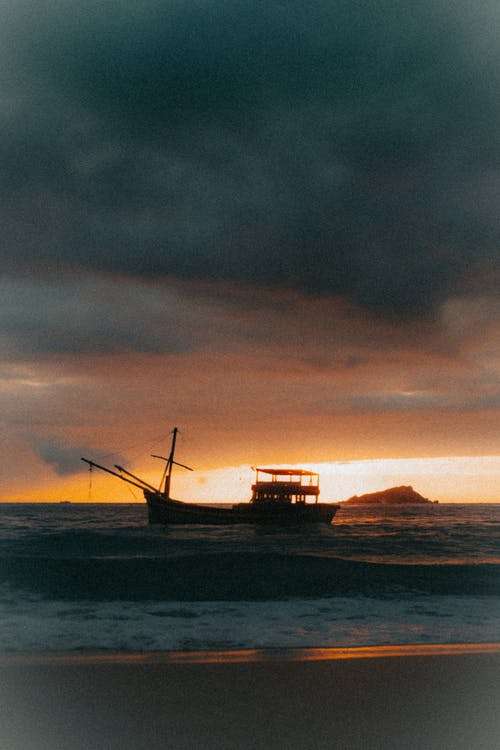 有关剪影, 日落, 海的免费素材图片