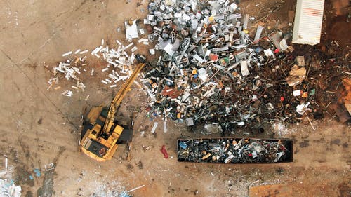 垃圾场的重型设备 · 免费素材视频