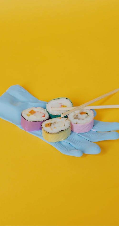 有关垂直视频, 寿司卷, 手套的免费素材视频