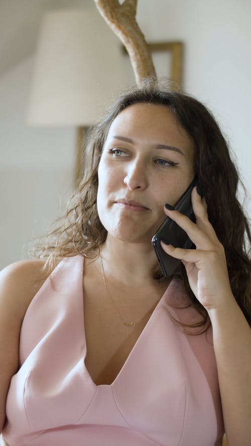 有关咖啡色头发的女人, 垂直视频, 女人的免费素材视频