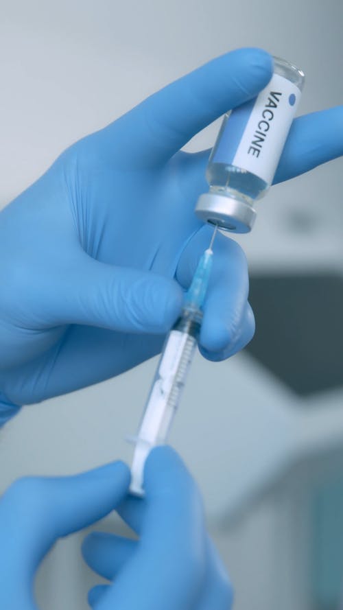 有关乳胶手套, 冠状病毒病疫苗, 垂直视频的免费素材视频