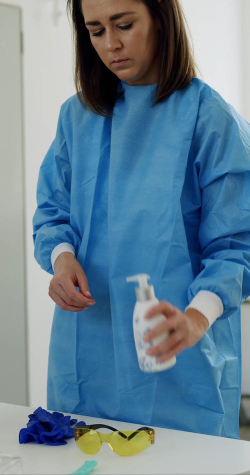 有关垂直视频, 女人, 实验服的免费素材视频