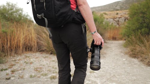 拿着照相机的人 · 免费素材视频