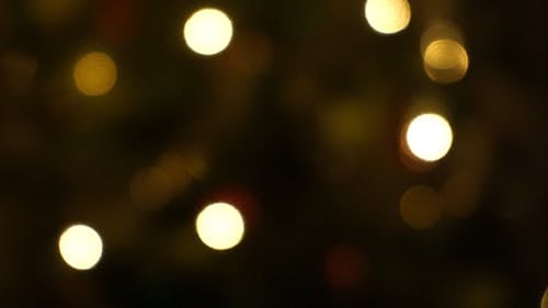 焦外的圣诞灯闪烁的镜头 · 免费素材视频