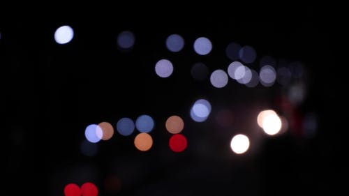 晚上的城市灯光聚焦摄影 · 免费素材视频