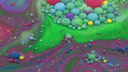 液体中的彩色涂料的混合物 · 免费素材视频