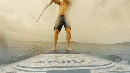 有关人, 冲浪板, 划桨冲浪的免费素材视频