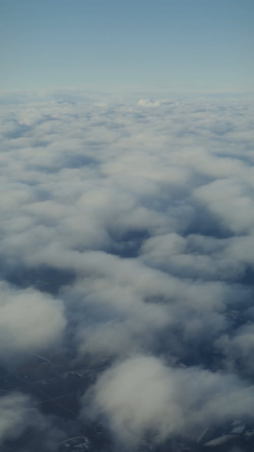 有关土地, 在云层之上, 垂直的免费素材视频