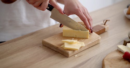 有关乳酪, 刀, 切片的免费素材视频