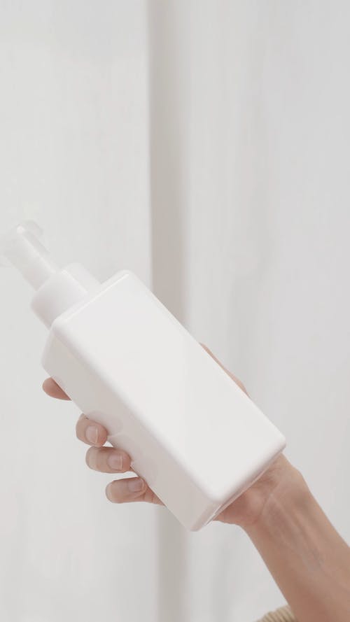 有关乳液, 人, 垂直视频的免费素材视频