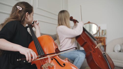 有关儿童, 坐, 大提琴家的免费素材视频